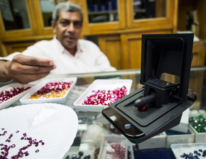 The Presidium Synthetic Ruby Identifier in action. This author took the SRI for a field test in the Wat Koh, a Bangkok neighborhood where dealers specialize in imitation and synthetic gemstones. 