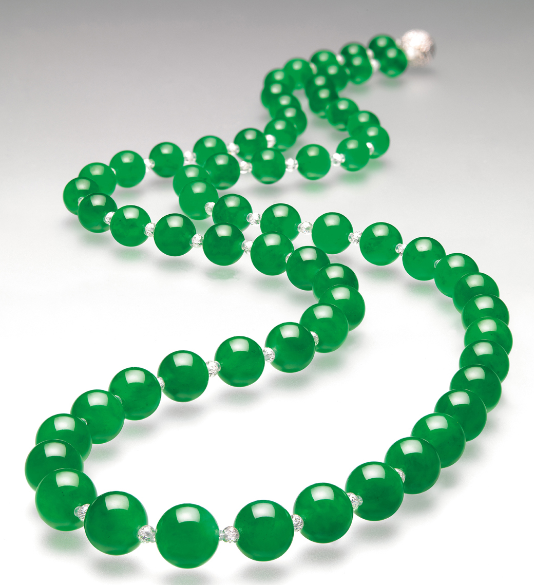 Figure 4. Doubly Fortunate In 1997, this necklace of 27 perfectly matched beads cut from the famous "Doubly Fortunate" jadeite boulder set a new record for jade, selling for an amazing US$9,390,922. Image © Christie's
