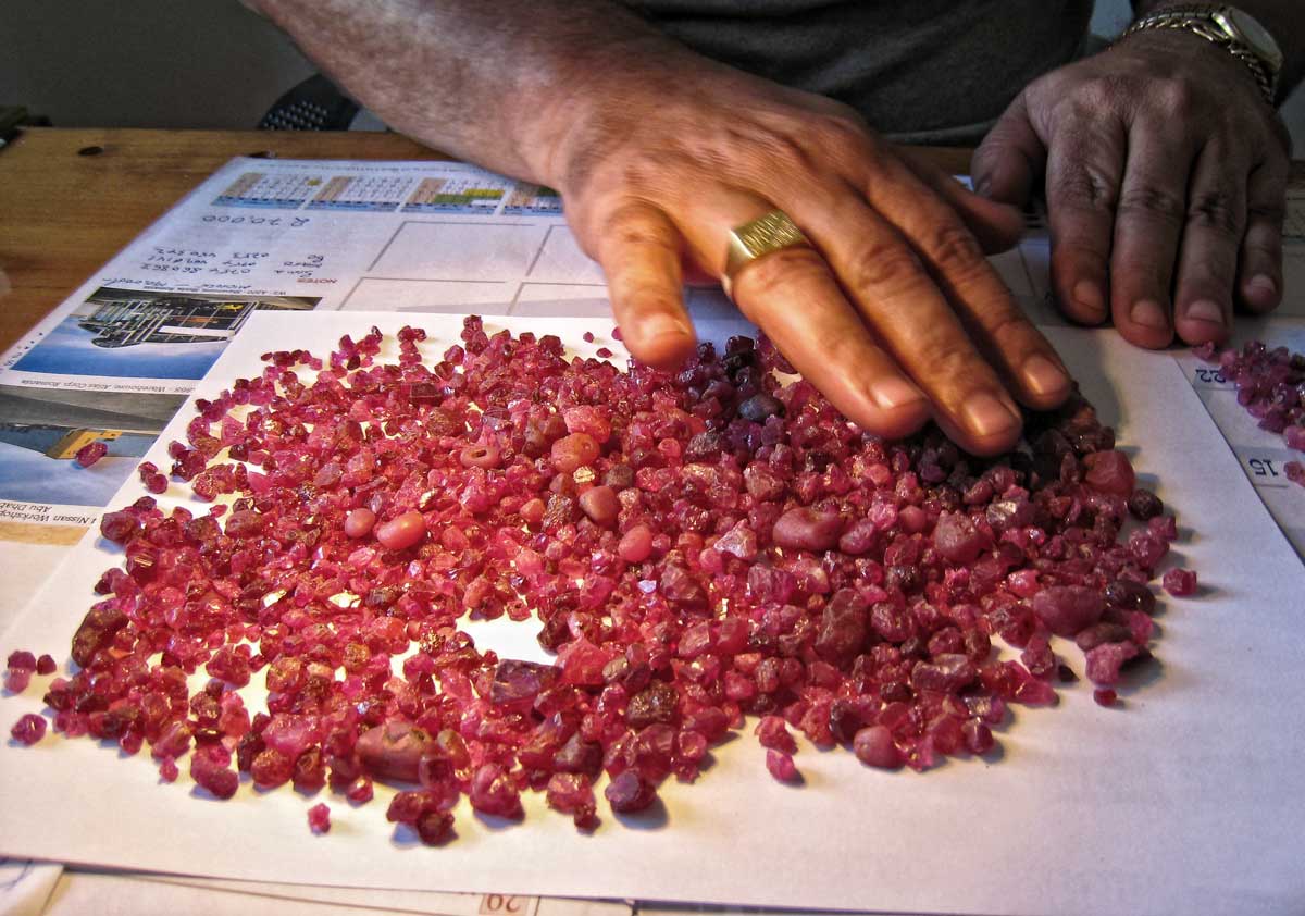 A bit of candy in the office of Spiro, a Morogoro-based Greek dealer. Rough spinel from the Summer 2007 find at Mahenge. Photo:  Richard W. Hughes