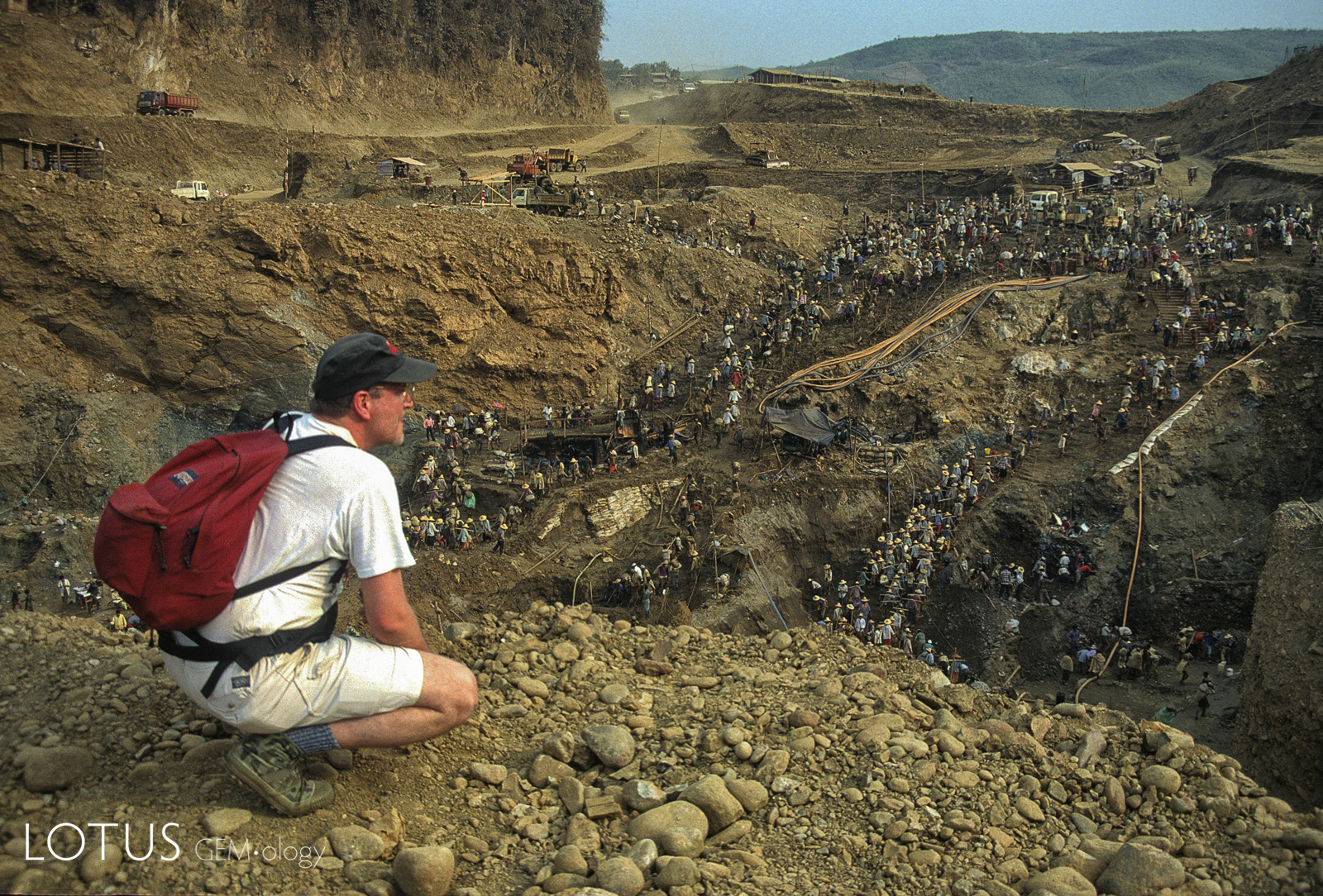 In 1997, I was back for more, this time in the dry season. Crossing a small hill from Hpakan, was a site that still leaves me stunned. Thousands of miners carry rock out of a huge hole. It was one of the most extraordinary sights I've ever seen in my life.