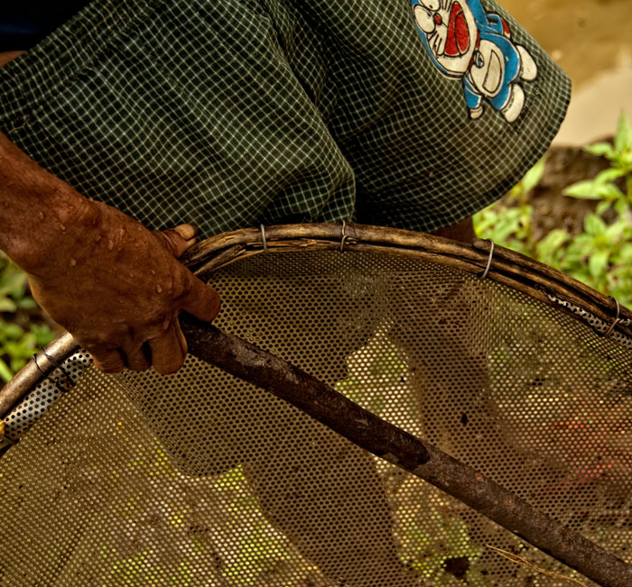The primitive tools of one of Thailand's last ruby miners. Photo © Richard W. Hughes, April 2009.