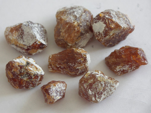 In addition to spinel, clinohumite is also recovered at Kuh-i-Lal. Cut stones can be lovely and are locally termed "sunflower stone." Such stones have also been mentioned in the ancient accounts of the mines. Colorless forsterite (not pictured) is also found. Photo: Vincent Pardieu/fieldgemology.org