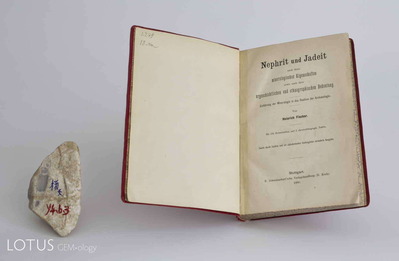 Title page from the 1880 edition H. Fischer's Nephrit und Jadeit. Initially published in 1875, it was the first monograph in an Occidental language to be solely devoted to jade. At left is a piece of rough Burmese "ice" jadeite, with a small window polished through the skin.