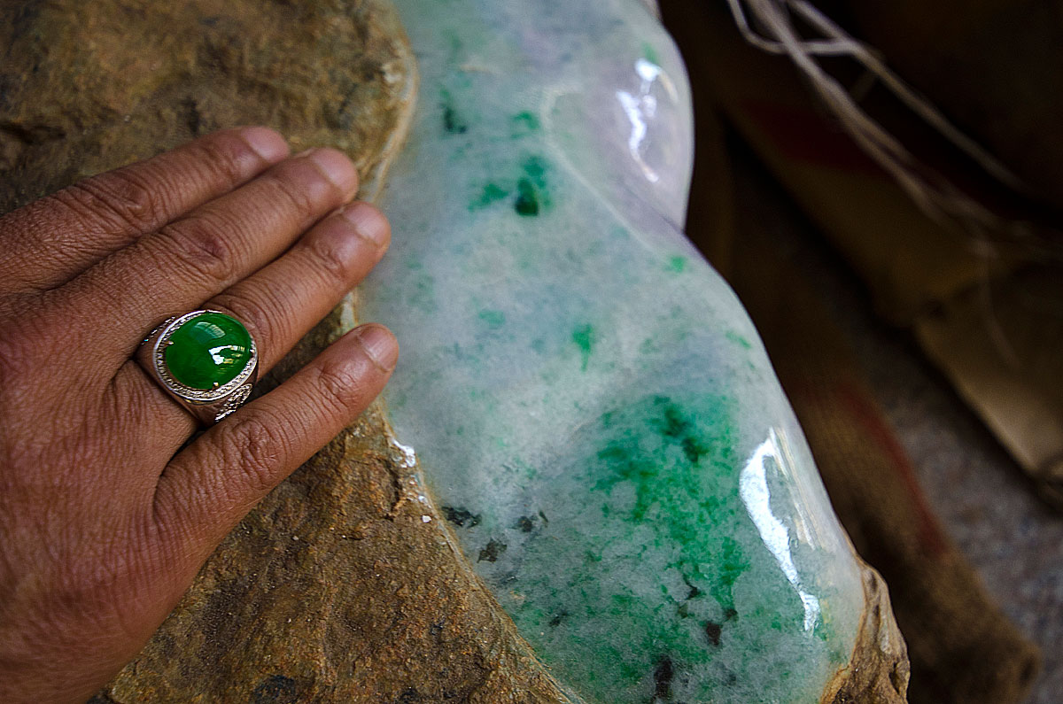 Figure 13. Although nephrite jade is China's original "Stone of Heaven," fine jadeite, as shown here, is the most sought-after of jades in the Chinese community today. While Chinese nephrite has a waxy luster, that of fine jadeite is almost vitreous. Photo Richard W. Hughes in Ruili, China.