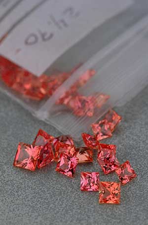 Bulk-diffusion treated orange sapphires of the type described above, purchased in Bangkok by Pala International in Dec., 2001. Photo: Robert Weldon