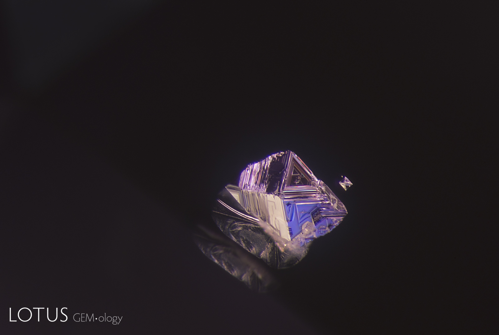 A spinel octahedron, frozen in time; Sri Lanka. Photo: E. Billie Hughes; click on the image for a larger photo