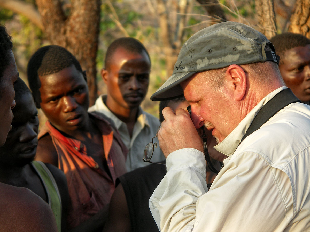 Hot stuff Richard Hughes examining a sapphire in Tanzania's Tunduru district. Photo: Vincent Pardieu