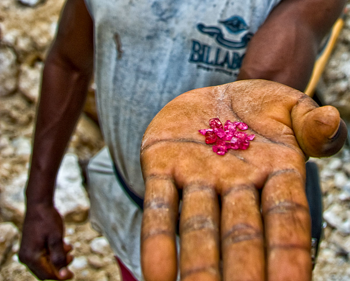 The fruit of excruciating labor, a handful of fine red spinels from Ipanko, near Mahenge. Photo: Richard W. Hughes