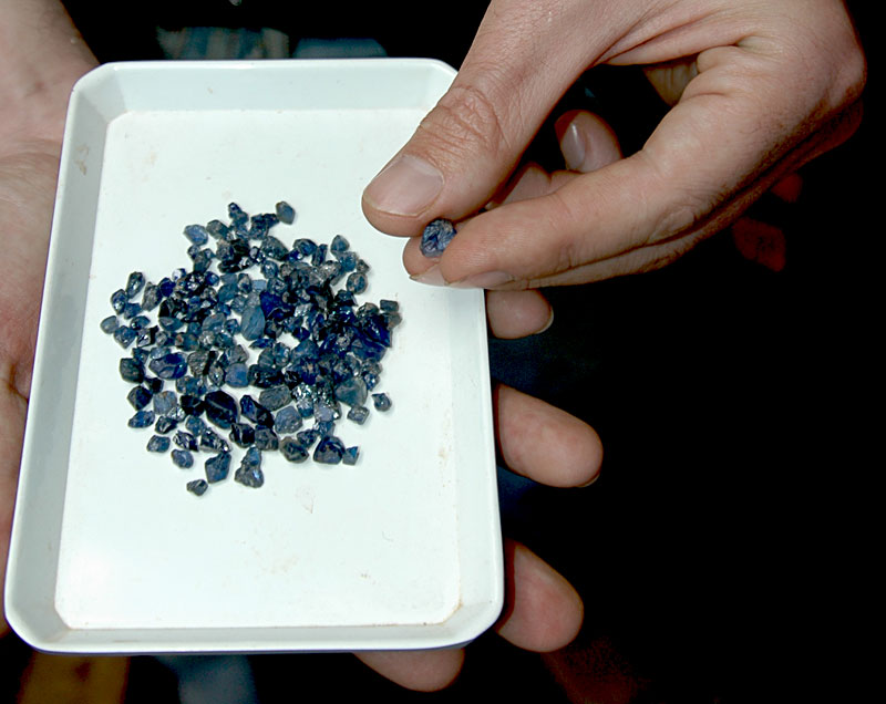A plate of Andrebabe sapphires on offer in Andilamena. Photo: Richard W. Hughes