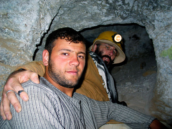 A miner with Vincent Pardieu inside the ancient galleries at Kuh-i-Lal spinel mines. Photo: Dana Schorr