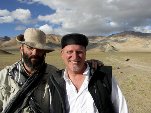 Vincent Pardieu and Richard Hughes with the Snezhny ruby mines in the distance. Photo: Guillaume Soubiraa