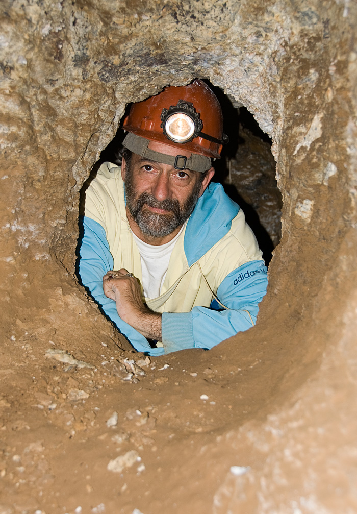 Dana Schorr inside one of the ancient galleries at the storied Kuh-i-Lal spinel mines. Photo: Richard W. Hughes