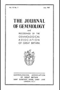 Solid inclusions in corundum and almandine garnet from Ceylon, identified by x-ray powder photographs