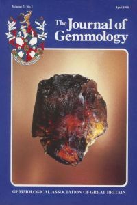 Oriented lath-like inclusions of a new type of spinel