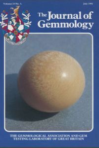 Surface features on natural rubies and sapphires derived from volcanic provinces