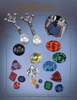 Fluxes and the heat treatment of ruby and sapphire
