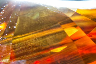 When Sri Lankan yellow sapphires with exsolved particles are heat treated, magnesium exits the particles and creates yellow-producing trapped-hole color centers. The result is color concentration around the particles, a process termed “internal diffusion” by gemologist, John Koivula.
