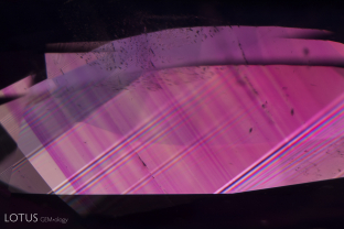 Polysynthetic twinning and angular growth zoning form a “plaid” pattern when viewed under crossed polars in this sapphire from Batakundi, Pakistan.